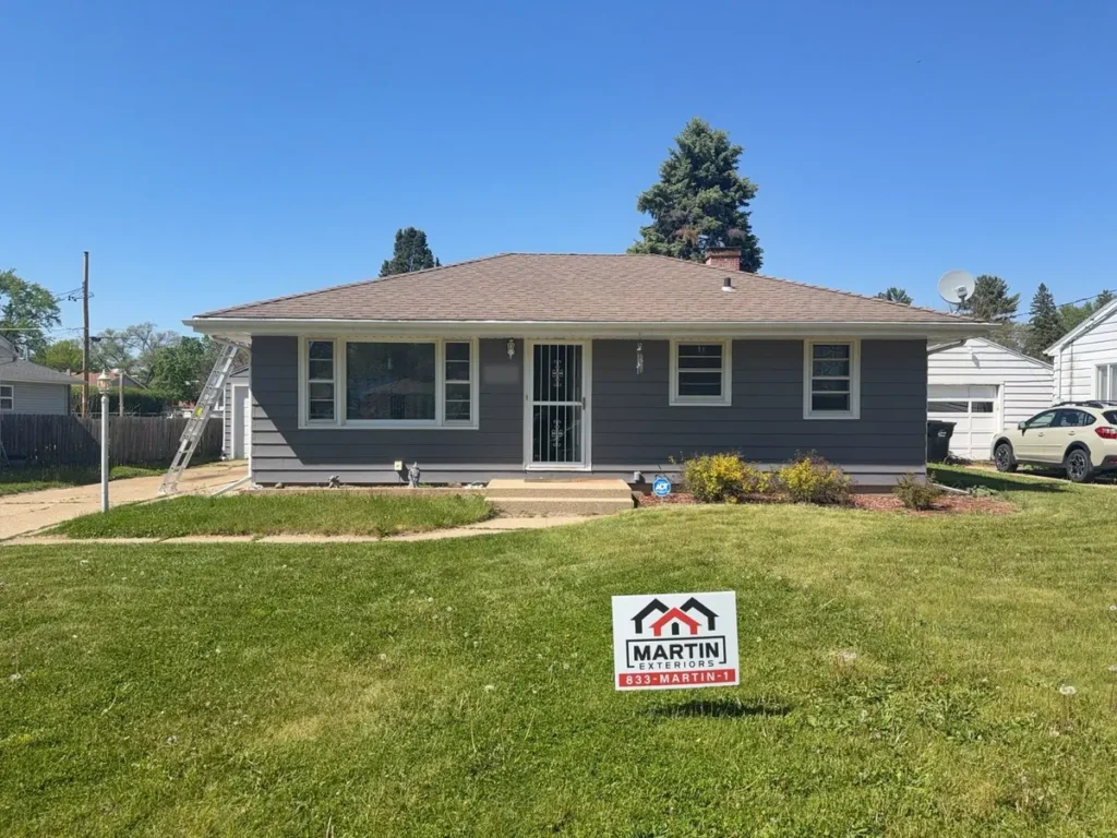Asphalt shingle roof on a one story home in Beloit, WI before the hail storm roof replacement