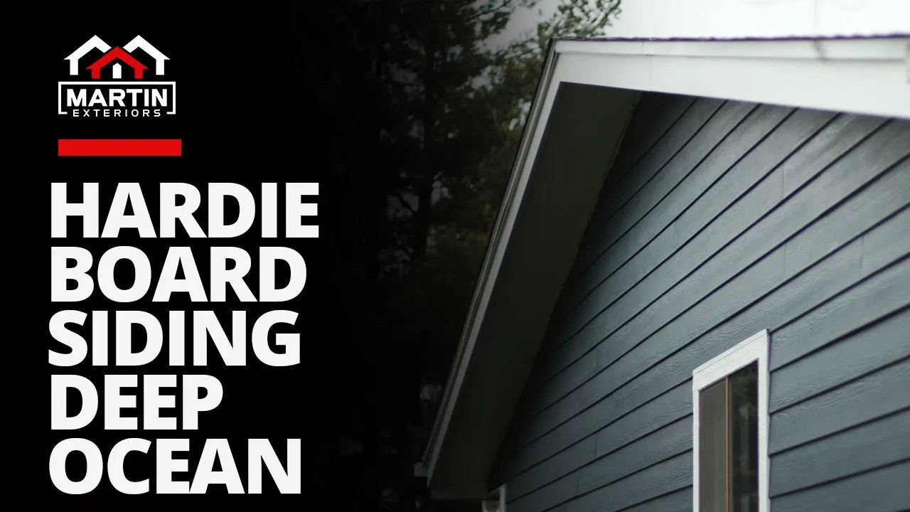 James Hardie fiber cement lap siding in Deep Ocean with white trim, installed by Martin Exteriors